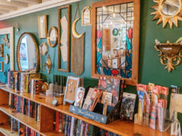 The Book Cellar Green Wall, Products, and Book shelf